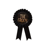 Значка „The groom“ в черен цвят със златист надпис за младоженеца, перфектна за ергенски партита и сватби,  Emotions Factory.