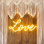 LED неонов надпис „Love“ в бял цвят, идеален за романтична атмосфера и декорация на сватби, годишнини, Свети Валентин и тематични партита, Emotions Factory.