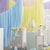 Парти украса за фон- Многоцветна завеса от ленти в пастелени цветове- Emotions Factory